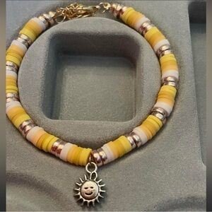Sun Charm Yellow and White Beaded Bracelet